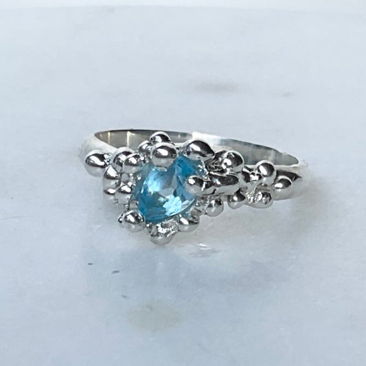 Swiss blue topaz molten ice ring