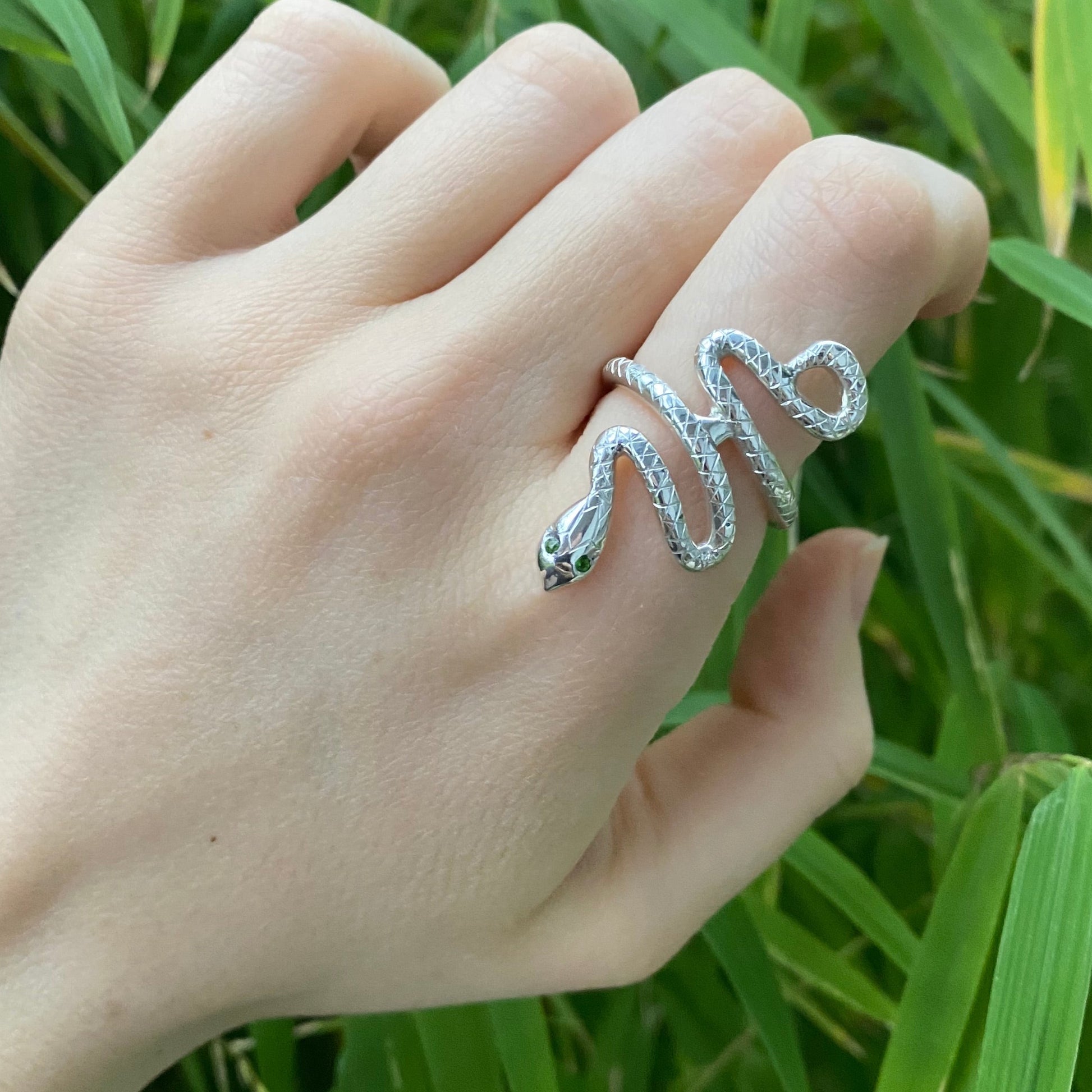 Statement snake ring shown on hand