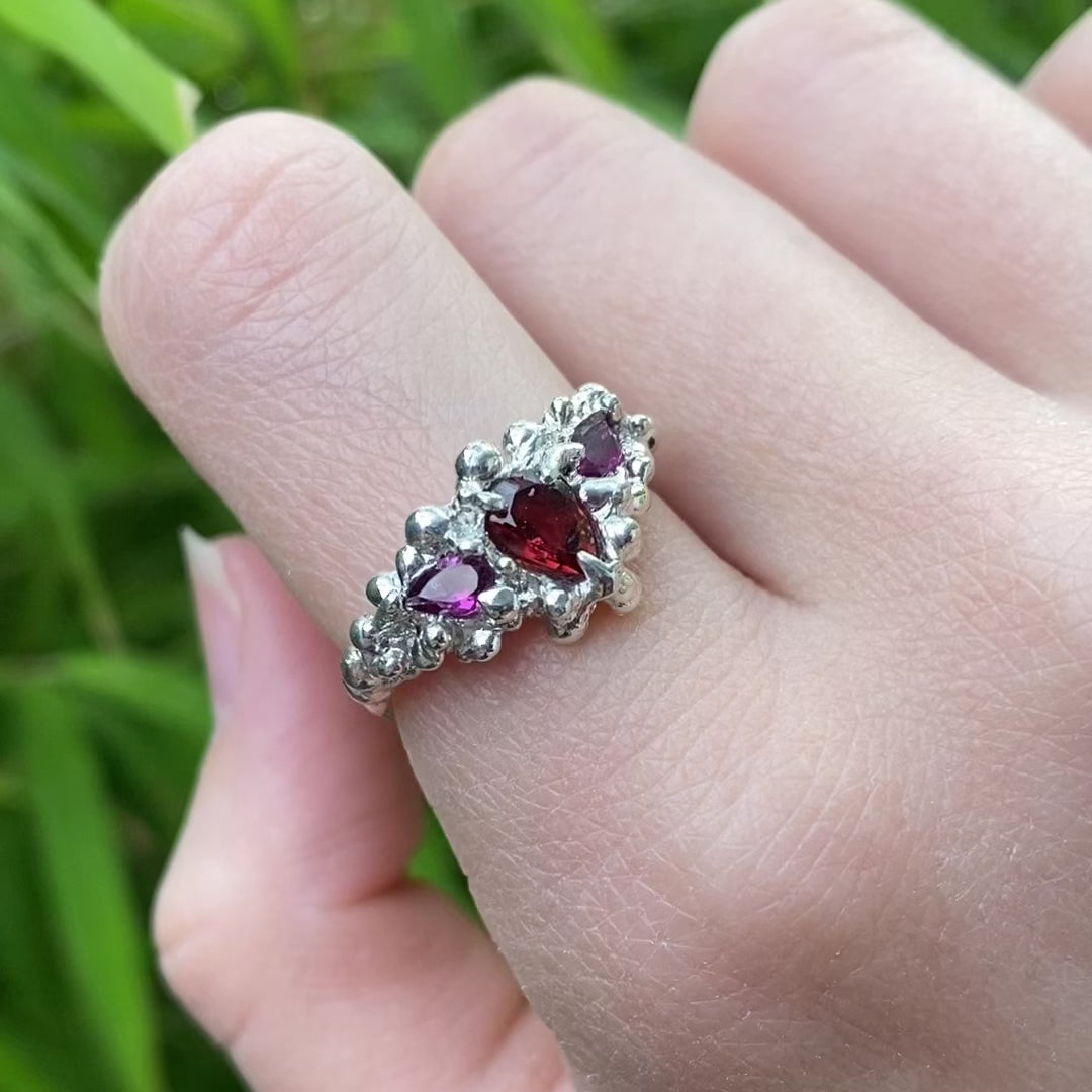 Three stone garnet unique ring