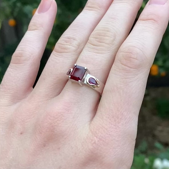 Unique garnet ring shown on model