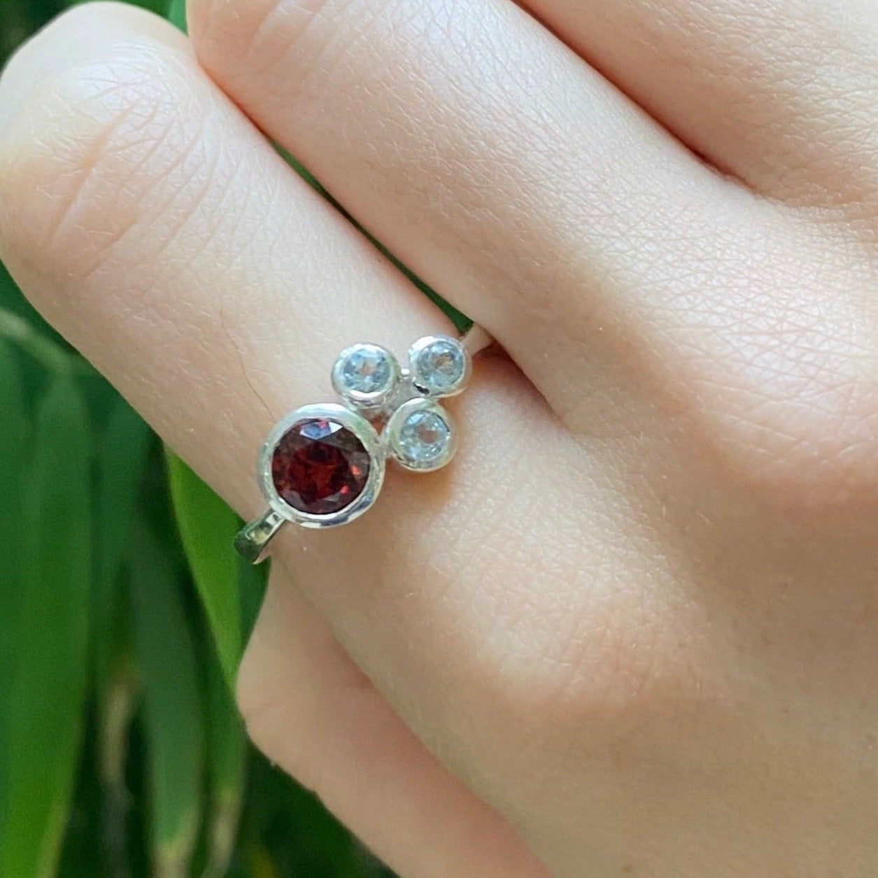 garnet ring on hand