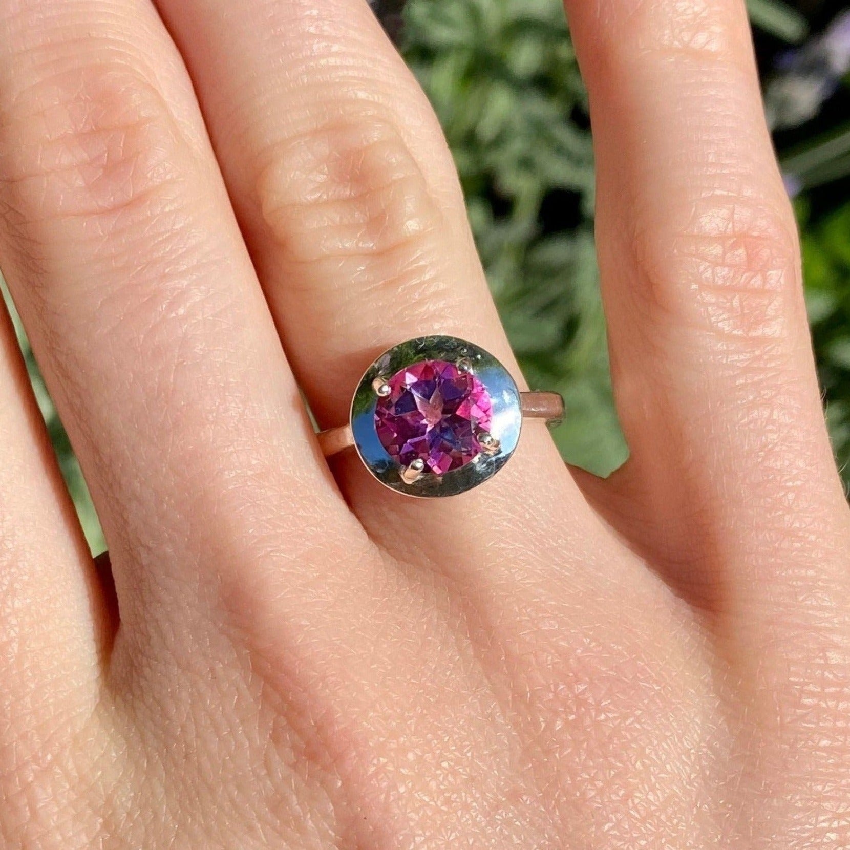 Large pink topaz ring shown on model