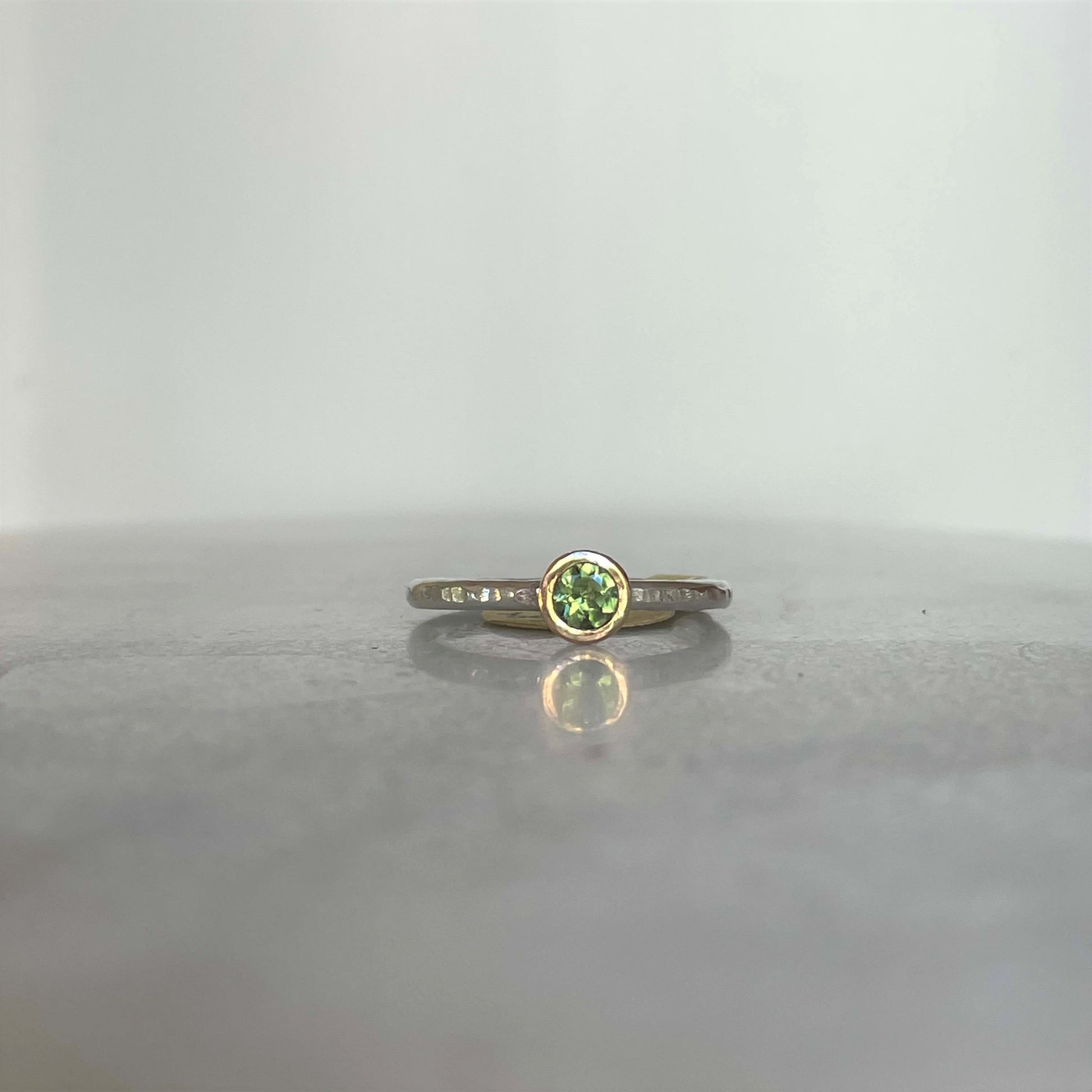 Green tourmaline sterling silver stackable ring with a touch of gold