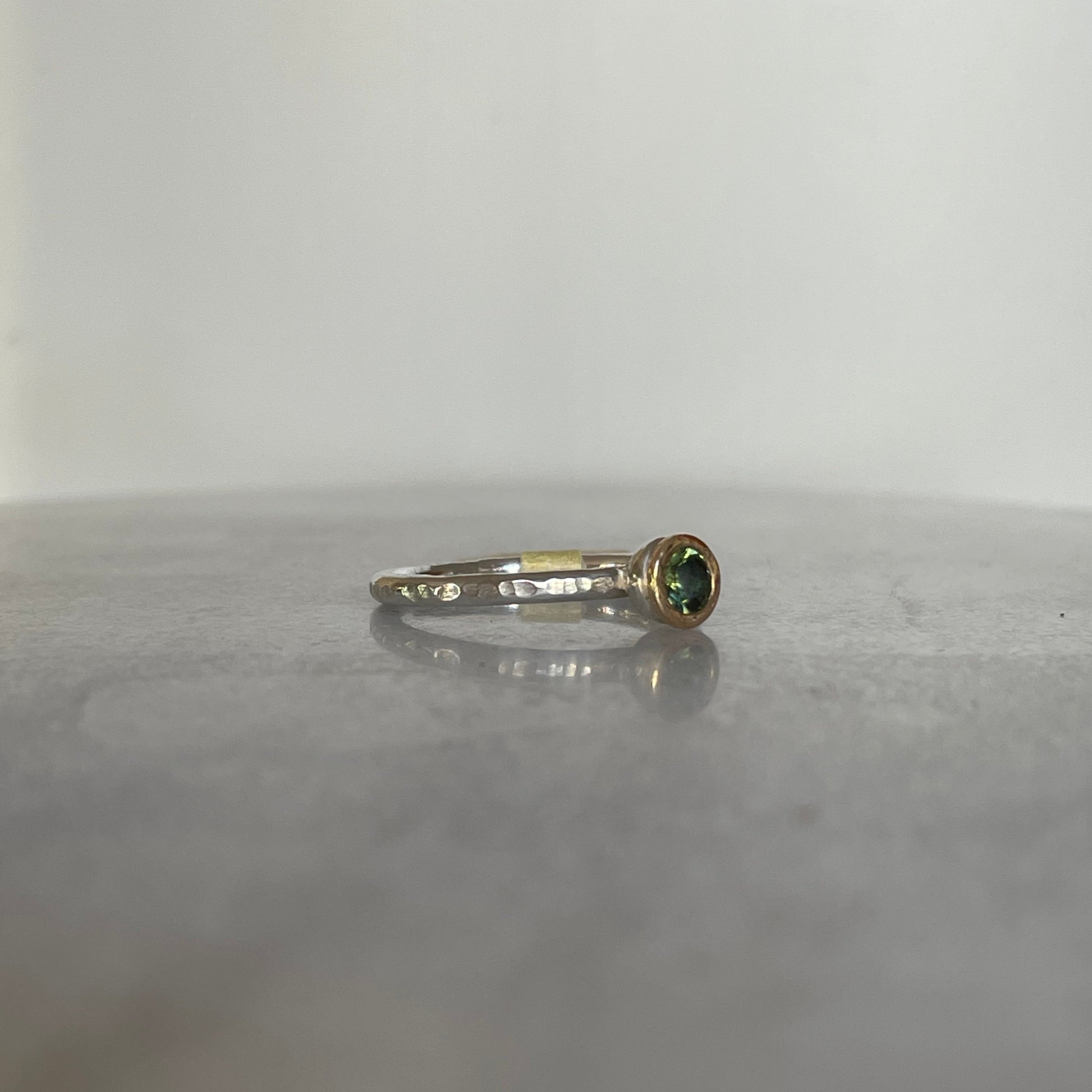 Green tourmaline gemstone stacking ring side view