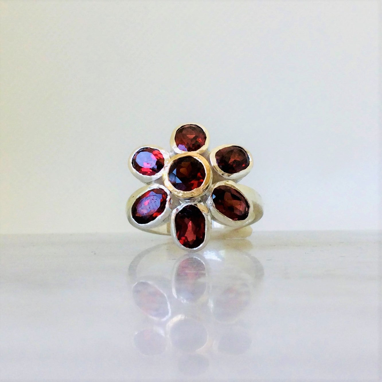 Flower garnet cluster ring