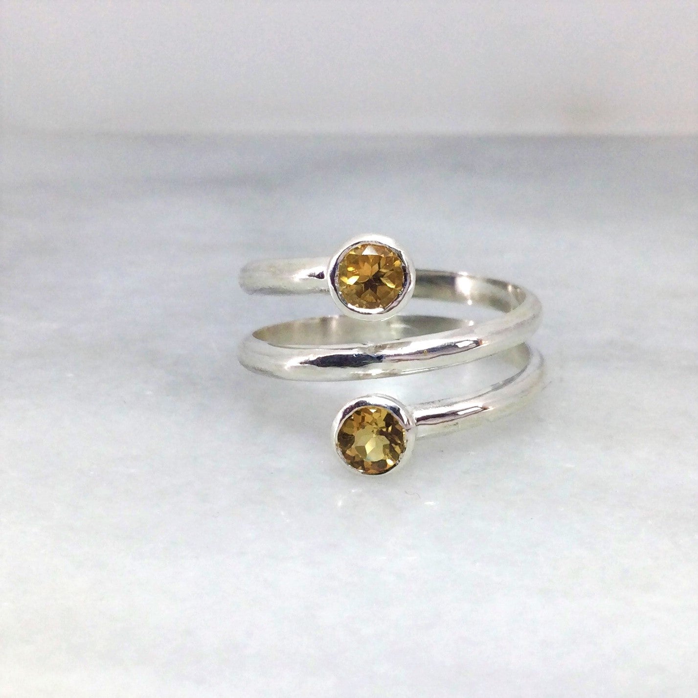 Silver coil ring with citrine gemstones